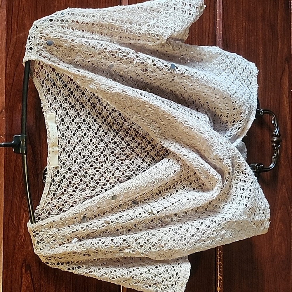 Taupe overhead shrug